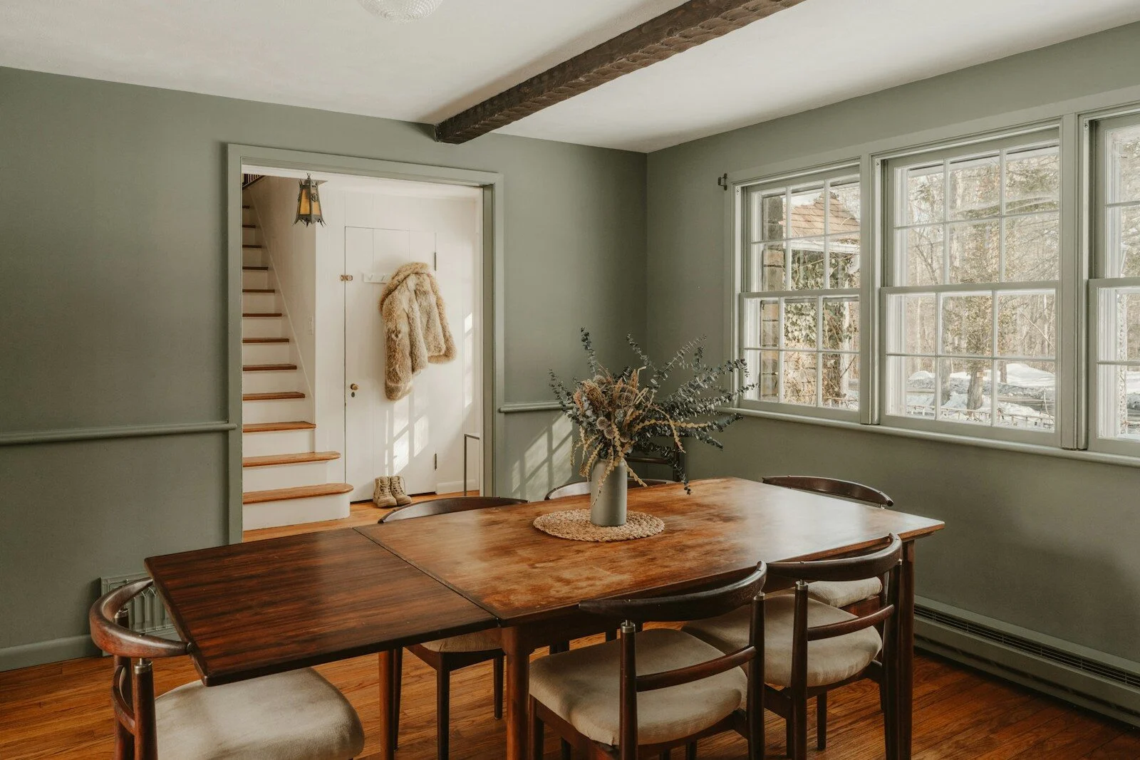 Dining room with wooden table and chairs